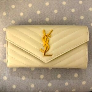 CASSANDRE MATELASSÉ LARGE FLAP WALLET IN GRAIN DE POUDRE LEATHER - Saint Laurent